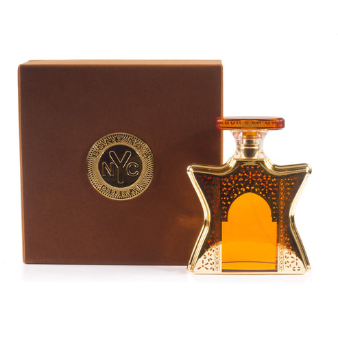 Bond No. 9 Dubai Amber Eau de Parfum in a luxury amber glass bottle.