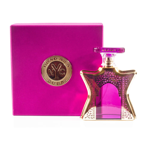 Bond No. 9 Dubai Garnet Eau de Parfum in a star-shaped purple glass vessel.